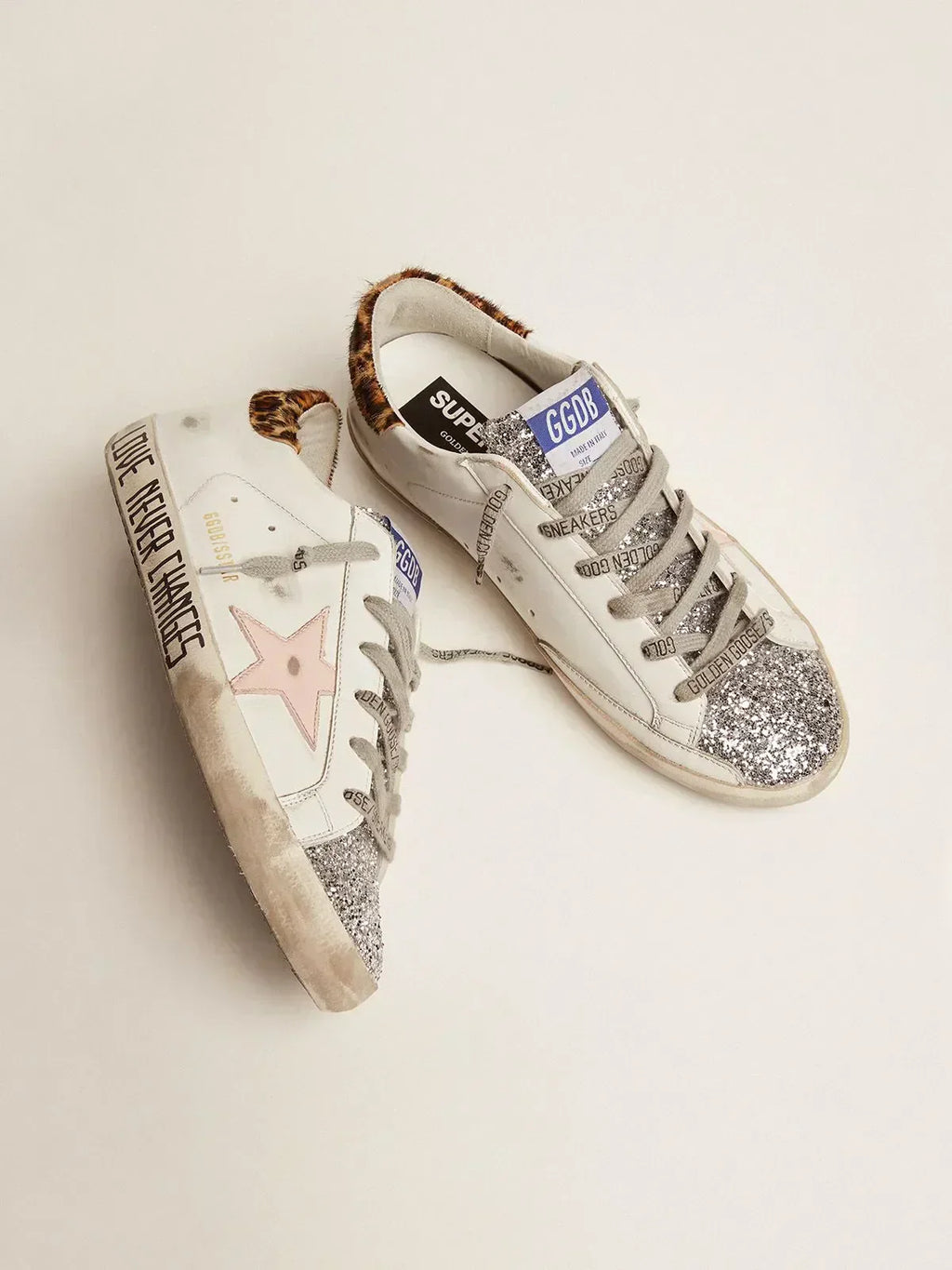 Super-Star sneakers with silver glitter tongue and handwritten lettering on the foxing