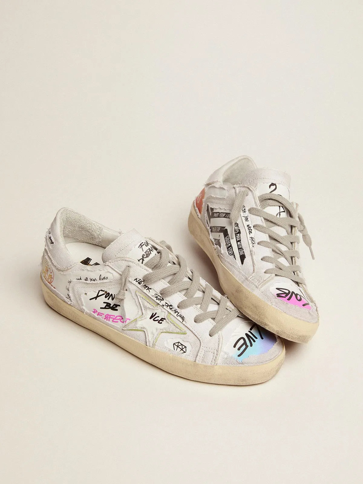Super-Star Dream Maker sneakers in white color with reverse construction and hidden multicolor details