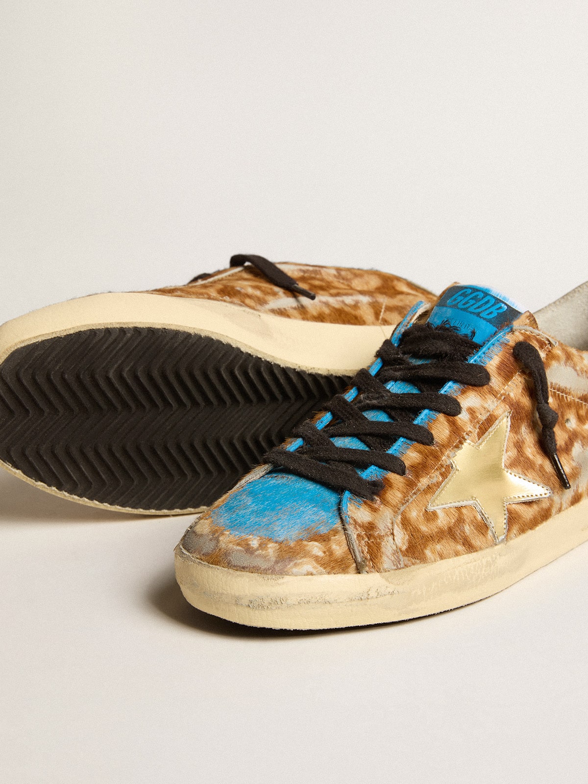 Men's Super-Star LAB in leopard pony skin with gold star and gray heel tab