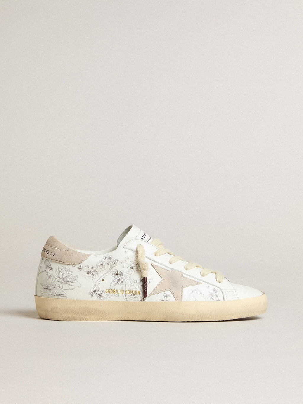 Men's Super-Star LTD CNY in white leather with lettering on the upper