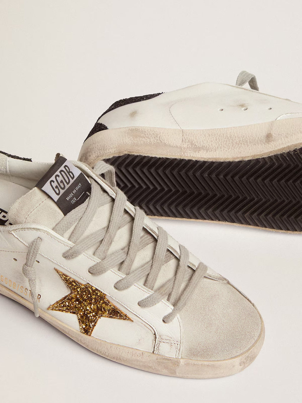 Women's Super-Star LTD with gold star and black glitter heel tab