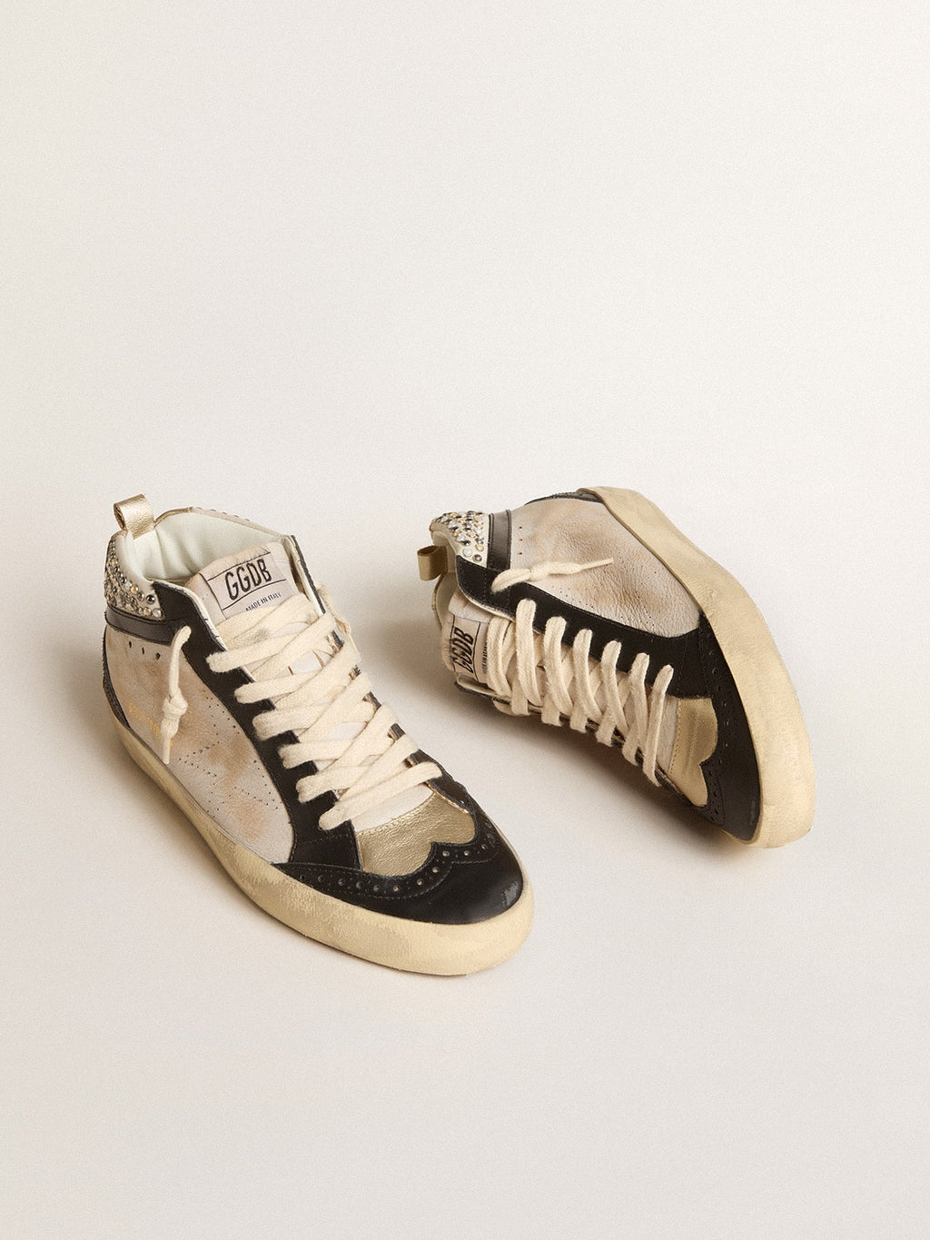 Women’s Mid Star LTD in black and white leather with pearls and perforated star