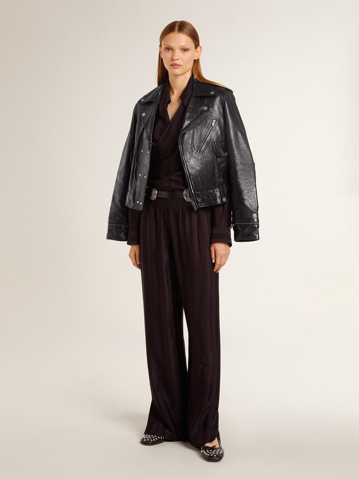 Women's black leather biker jacket with glossy effect