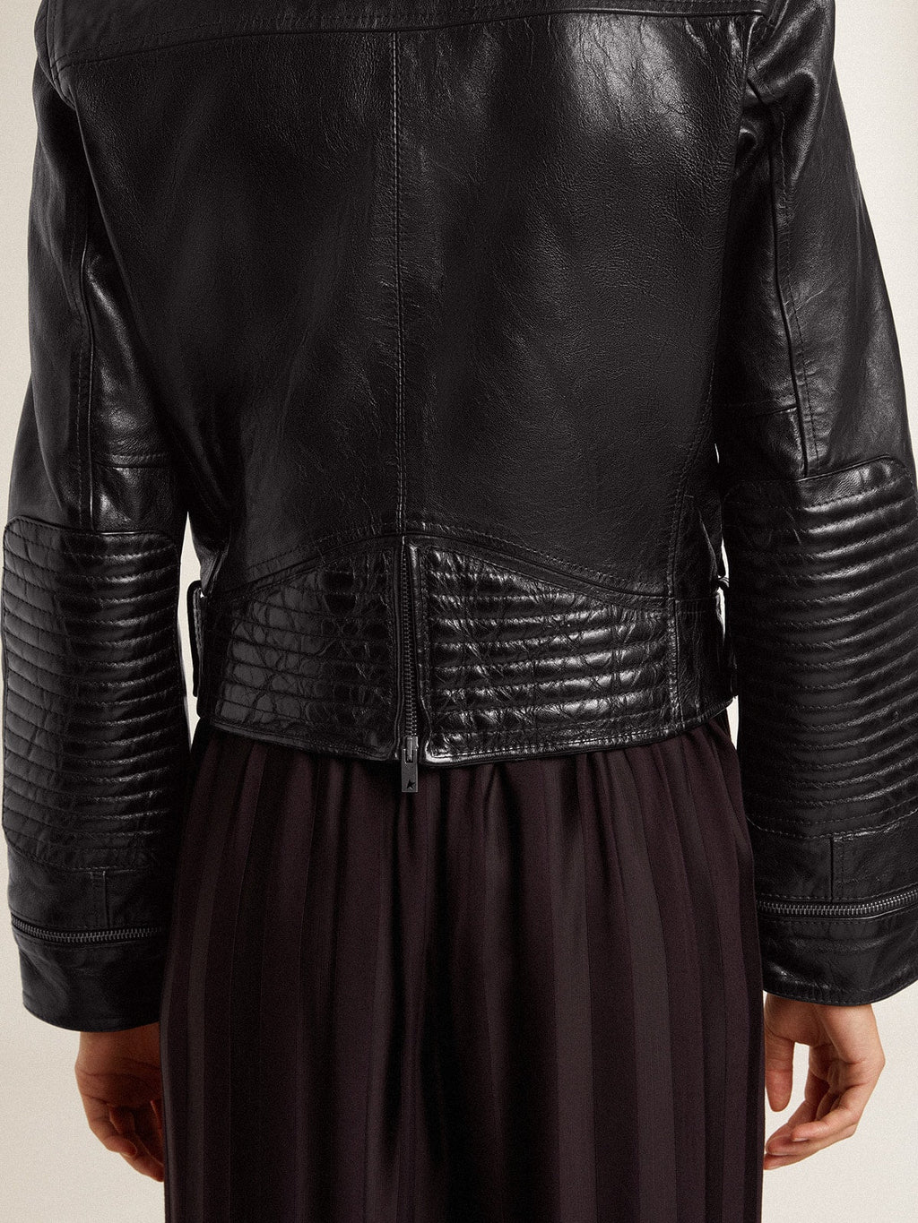 Women's black leather biker jacket with glossy effect